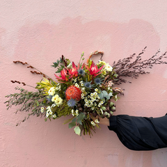 Bushland Birthday Wishes native flower arrangement featuring proteas, banksias, and wax flowers designed by FLORAqueen Fitzroy North